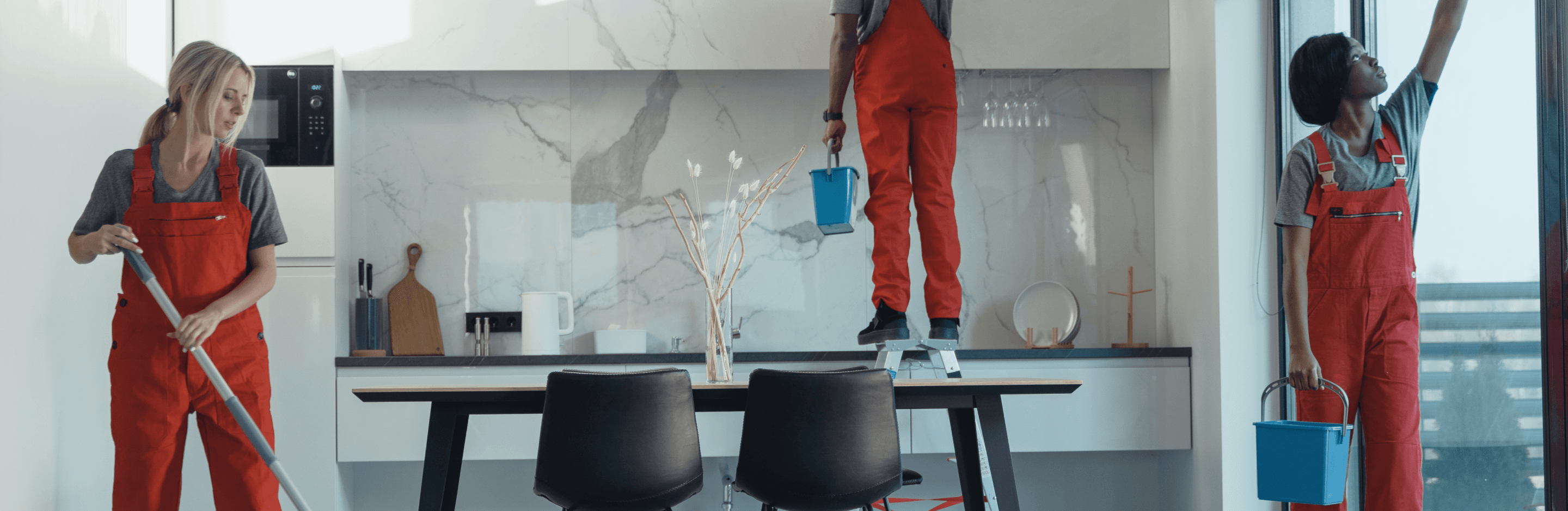 group of cleaners in luxury home